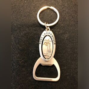 Fort Lauderdale silver tone key chain and bottle opener. Rotating center.